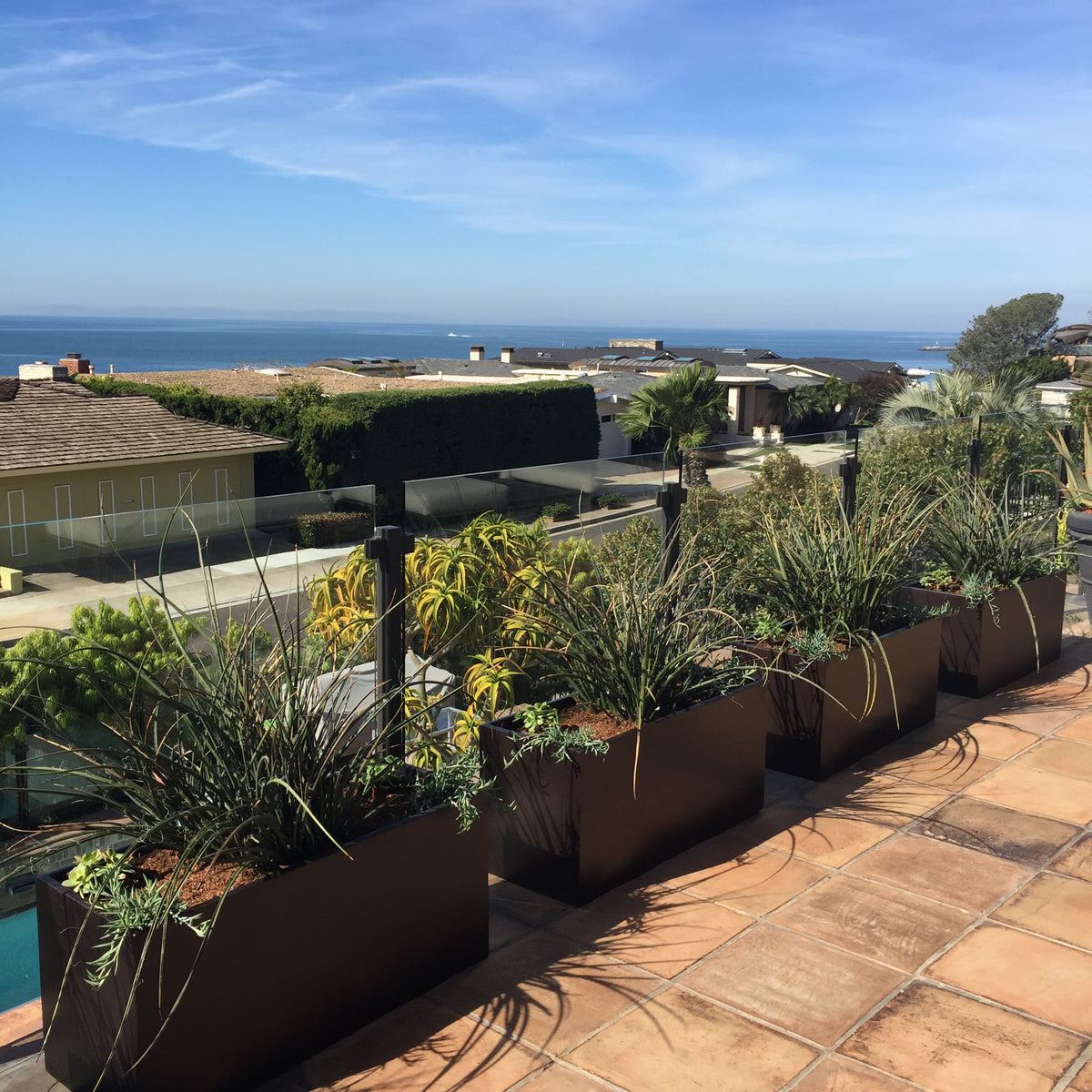 Brown Belmont Rectangle Fiberglass Planter Box  Outdoor Deck near the Ocean